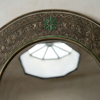 Handcrafted Arched Wall Mirror with Intricate Carved Frame